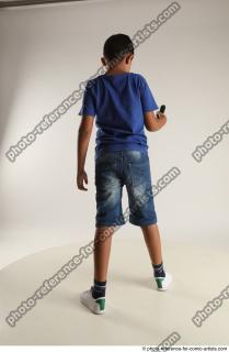 TIMBO STANDING POSE WITH GUN